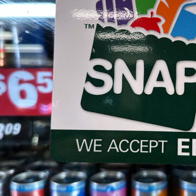 SNAP EBT information sign is displayed at a gas station in Riverwoods, Ill., Nov. 1, 2025. (AP Photo/Nam Y. Huh, File)