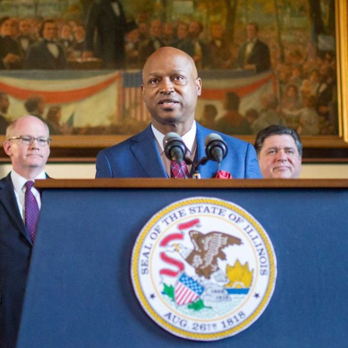House Speaker Emanuel “Chis” Welch, D-Hillside, speaks at a news conference about the state budget alongside Senate President Don Harmon, left, and Gov. JB Pritzker right, in May 2023 at the State Capitol. (Capitol News Illinois photo by Jerry Nowicki)