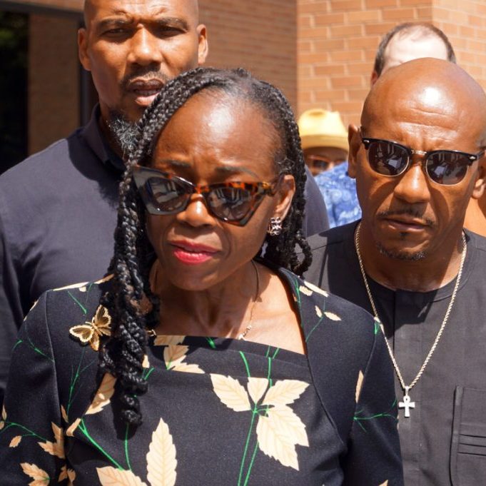 State Rep. Carol Ammons, left, and her husband, Champaign County Clerk Aaron Ammons, speak to reporters outside the federal courthouse in Urbana after pleading not guilty to corruption charges. (Capitol News Illinois photo by Peter Hancock)
